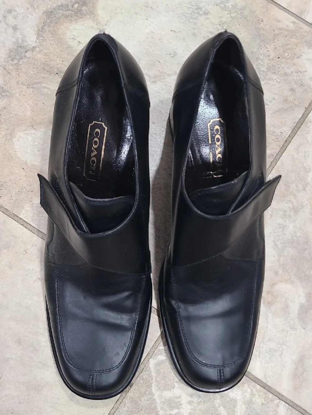 Coach sleek black